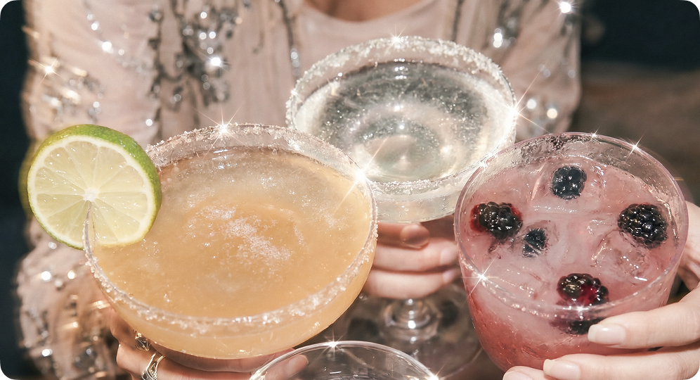 Three cocktail glasses with a margarita, martini, and blackberry drink — AI Photo Studio campaign image by CreativeWise