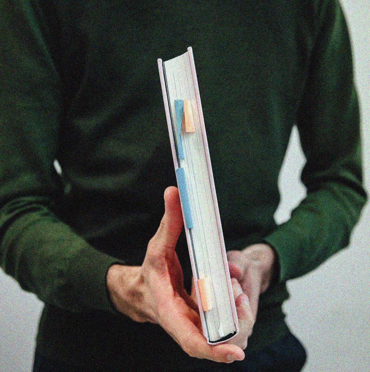 Onboard - Hands holding organized notebook