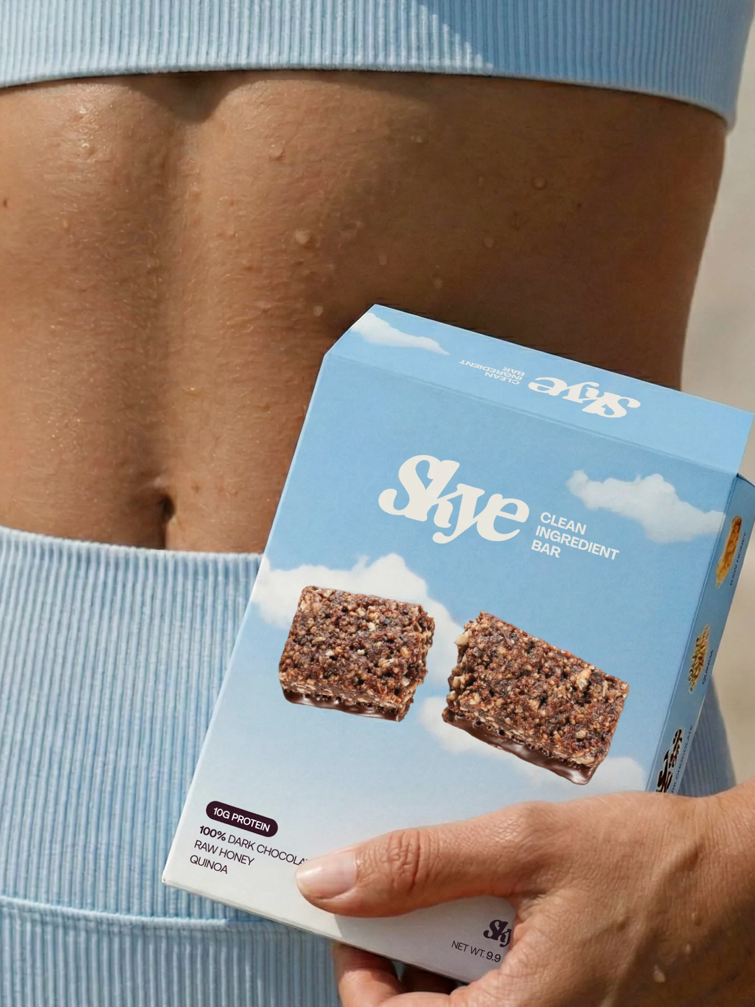Hand holding a Skye branded snack pouch