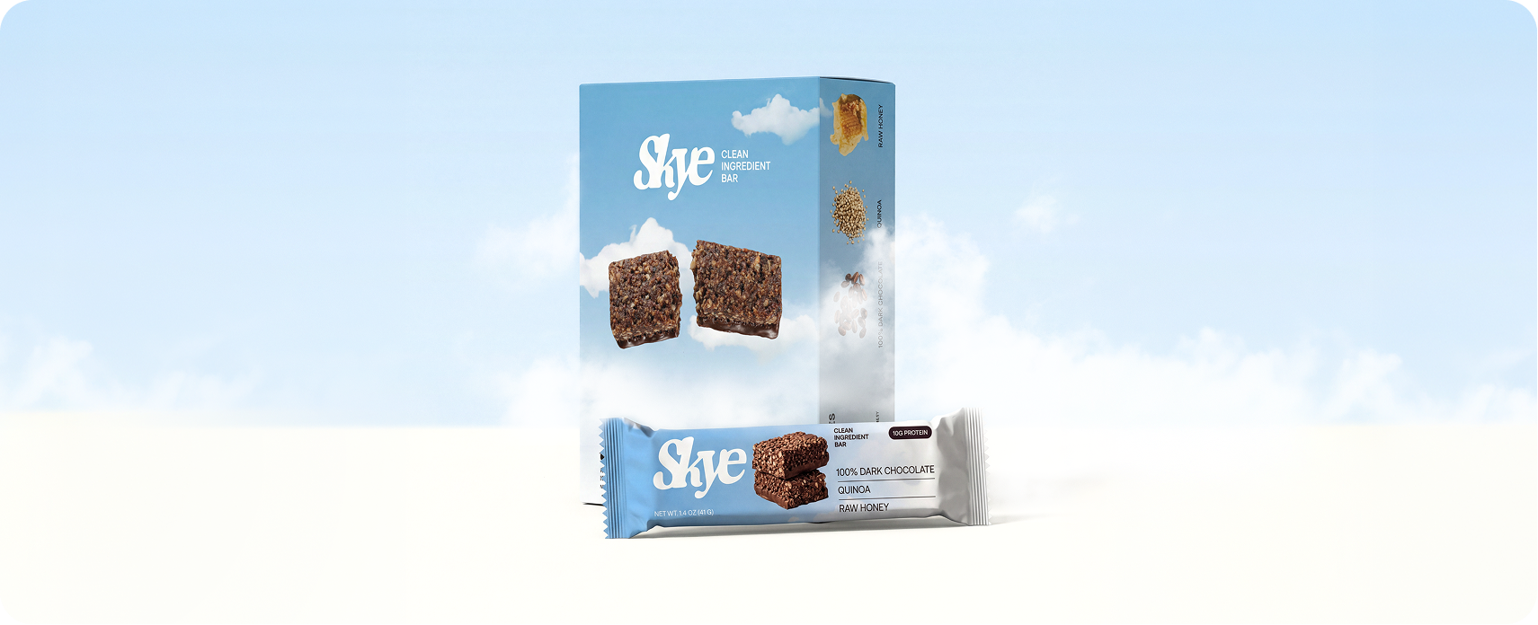 Skye — clean-ingredient protein bar retail box beside a single dark chocolate and quinoa bar, set against the brand's sky-blue cloud backdrop and soft wordmark
